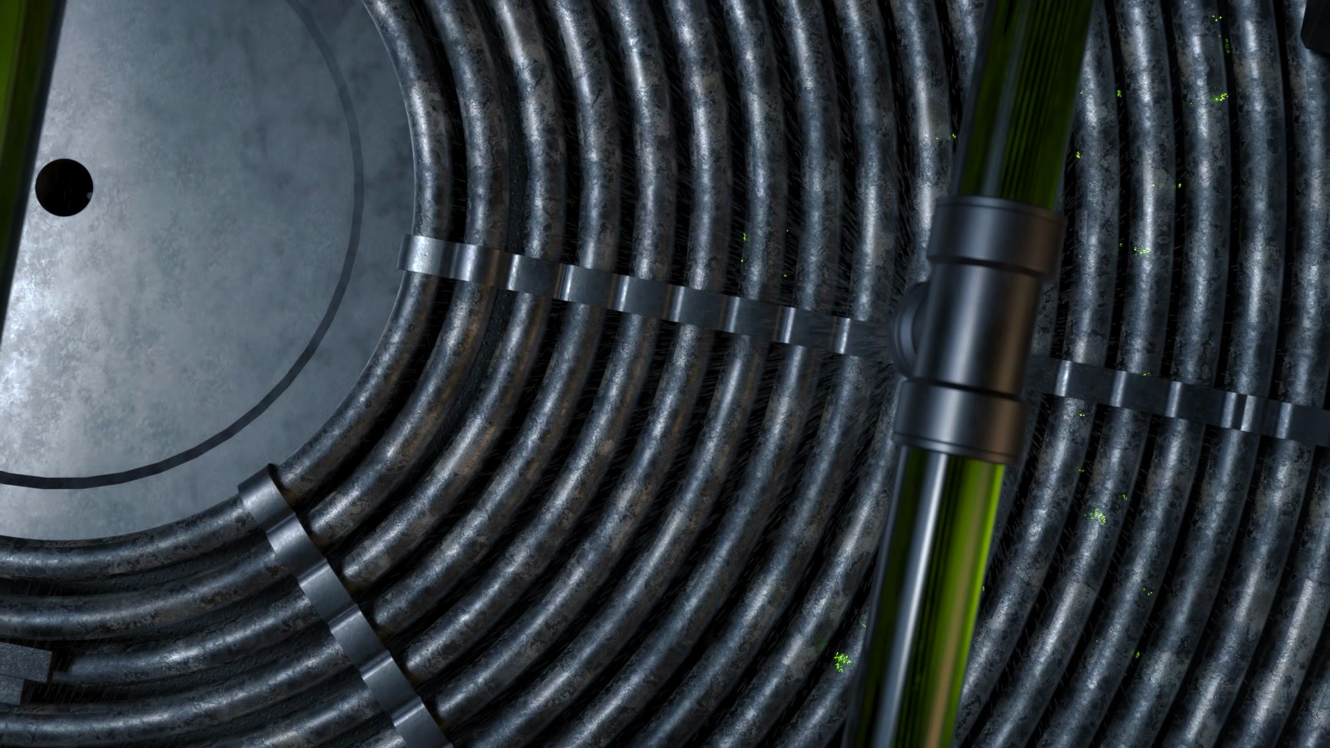 Detail of the cleaned pipe coil: bright pipes in concentric rings, a spray lance above.